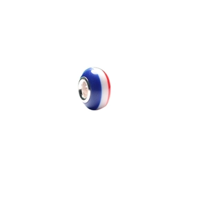 Close-up of blue white and red striped resin charm bead with silver metal core