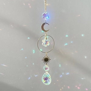 Golden sun and moon crystal suncatcher hanging ornament with rainbow light refraction