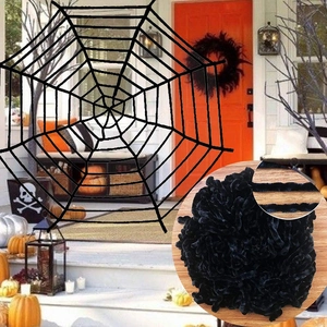 Detail of giant black spider web with plush texture for Halloween porch decoration