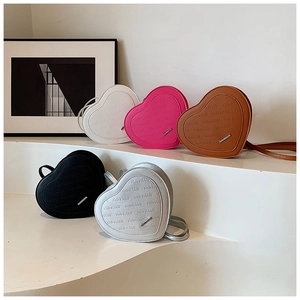 Chic heart-shaped backpacks for women in five colors with textured letter embossing