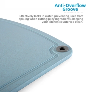 Detail of wheat straw cutting board showing anti-overflow groove and matte texture