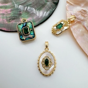 18K gold plated pendants with emerald green stones and natural shell inlay