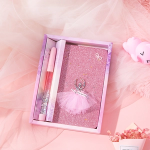 Detail of pink glitter notebook with 3D ballet girl and matching quicksand sequin pen