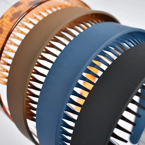 Wide non-slip headbands with teeth in black, blue, brown, and tortoise patterns