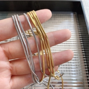 Minimalist gold and silver titanium steel snake bone chain necklace in long sweater style