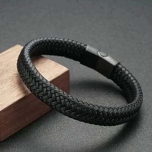 Men's minimalist braided black leather bracelet with a sleek magnetic metal clasp