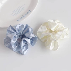 Blue and white cream satin scrunchies for hair buns with elegant silk pleats texture
