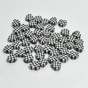 Detailed view of 10mm checkered heart clay beads for DIY handmade jewelry crafts