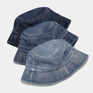 Foldable vintage washed denim bucket hats in dark, medium, and light blue shades