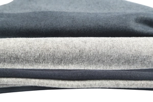 Macro shot of grey French velvet fabric showing fine knitting texture and double layers