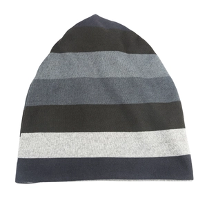 Detailed knit texture of striped French fleece beanie in classic multi-color design