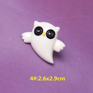 Detail of cartoon owl resin charm with dimensions 2.6x2.9cm for DIY halloween crafts