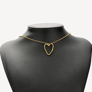 Elegant gold stainless steel heart pendant necklace on minimalist link chain for women