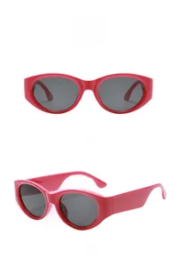 Detailed front and side views of rose pink oval sunglasses with wide temples