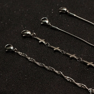 Minimalist stainless steel necklace set with cross pendant and snake chain in silver finish