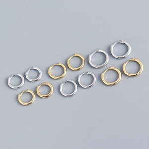 Pendientes de aro en forma de U de plata S925 con circonitas en oro y plata pulida