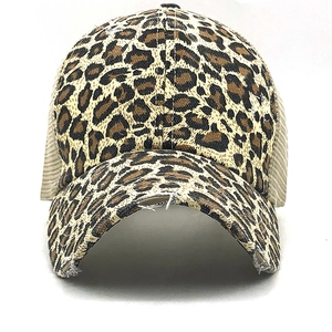 Close-up of leopard print baseball cap featuring distressed edges and breathable mesh back