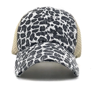 Detail of leopard print baseball cap with breathable mesh back and curved brim