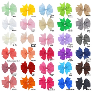 Detailed grid showing 30 colorful grosgrain ribbon bow clips for babies and girls