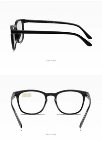 Detail view of black reading glasses showing spring hinges and technical lens specifications