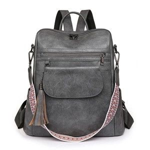 Gray vintage faux leather backpack for women with colorful strap and tassel detail