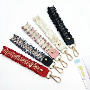 Colorful tweed braided wrist straps with golden metal hooks for bags and keys