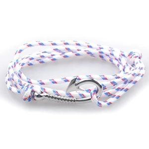Detail of nautical multi-layer braided rope bracelet with silver anchor hook clasp