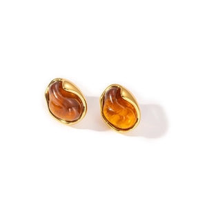 Vintage gold titanium earrings with irregular amber resin and white zircon inlay