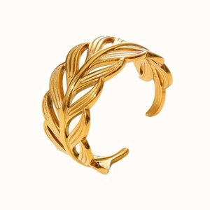 Macro shot of gold leaf texture on an adjustable bohemian style 18k plated ring