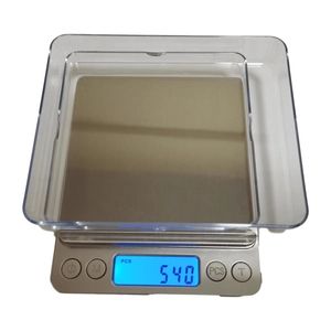 Digital kitchen scale with silver metal platform and blue backlit LCD display showing 540g