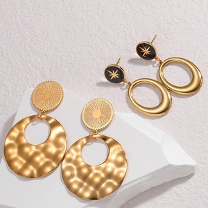 Chic 18K gold geometric hollow earrings with textured hammer finish on white stone