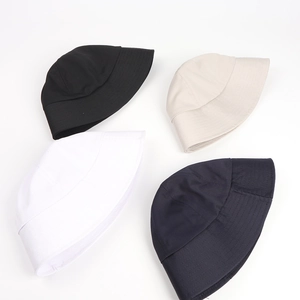 Classic round dome bucket hats in black, beige, white, and navy blue set on white background