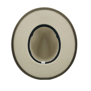 Internal detail of wool felt hat featuring 100% polyester label and black sweatband