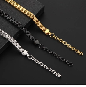 Three-color double-row Cuban link bracelets in gold, black, and silver stainless steel