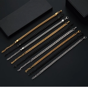 Detailed display of nine stainless steel Cuban chain bracelets in gold, silver, and black