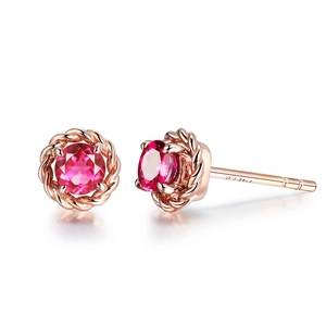 Rose gold rope twist earrings featuring a round cut pink tourmaline with 0.4ct engraving