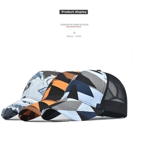 Detailed view of three tie-dye trucker hats with breathable mesh and curved brims