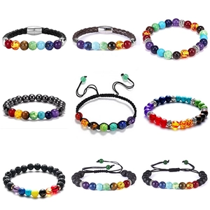 Collection of nine colorful chakra bead bracelets with leather and adjustable cord styles
