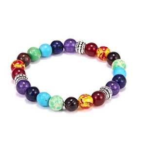 Detailed shot of rainbow beaded bracelet with silver spacers and elastic cord