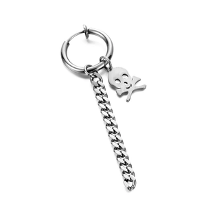 Detail of punk style hoop earring with long curb chain and silver skull pendant