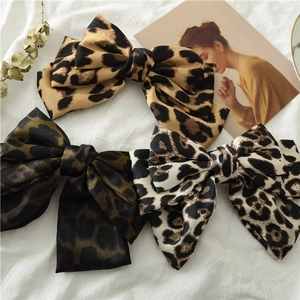 Leopard print satin bow hair clips set in brown green and beige fabric styles
