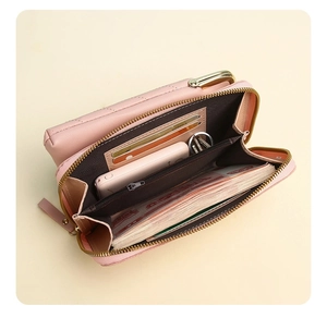 Internal view of pink quilted PU leather wallet showing card slots and phone pocket