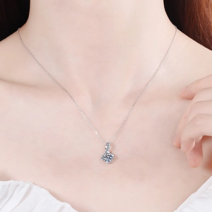 Elegant S925 sterling silver necklace with sparkling solitaire pendant worn by a model