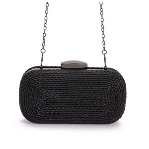 Detailed close-up of black woven texture and dark grey metal chain on evening clutch bag