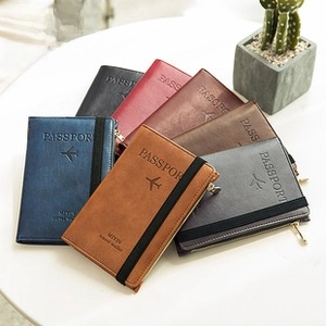 Short RFID blocking travel wallet with elastic band and zipper in various colors