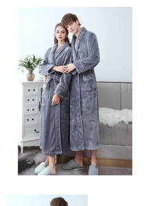 Close-up of thick dark grey flannel bathrobe featuring lapel design and waist belt detail