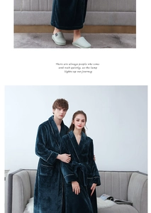 Detail of thicken flannel bathrobe with contrasting piping and side pockets for couples
