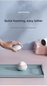 Detail of manual scalp massager brush creating rich foam for deep hair cleansing