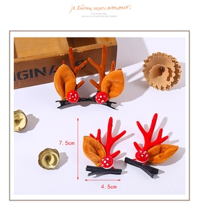 Détail des pinces à cheveux bois de renne de Noël en peluche avec dimensions 7,5 cm