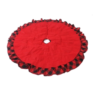 Red Christmas tree skirt with buffalo plaid ruffled edges and secure center ties